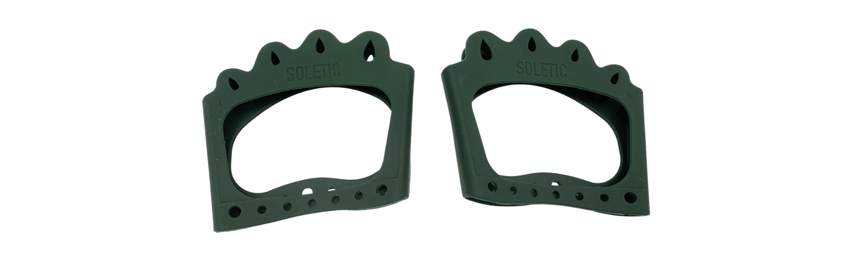 Two green plastic foot grips on a white background